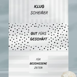 May include: A white and gray striped background with three text blocks. The top block reads "KLUG SCHEIBER", the middle block has black polka dots and reads "GUT F&Uuml;RS GESCH&Auml;FT", and the bottom block reads "F&Uuml;R BESCHISSENE ZEITEN".