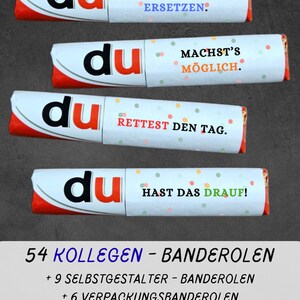 May include: Four candy bar wrappers with the word "du" in black and red, each with a different phrase in German. The phrases are "BIST NICHT ZU ERSETZEN", "MACHST'S M&Ouml;GLICH", "RETTEST DEN TAG", and "HAST DAS DRAUF!".