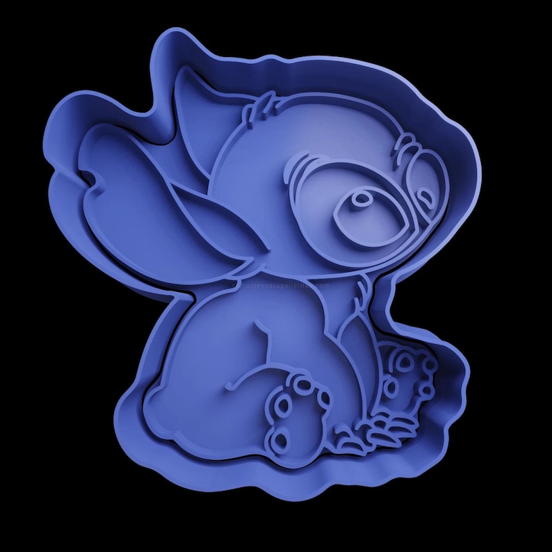 May include: Blue plastic cookie cutter shaped like Stitch from the Disney movie Lilo & Stitch. The cutter is detailed with Stitch's signature features, including his big eyes, ears, and three-fingered hands.