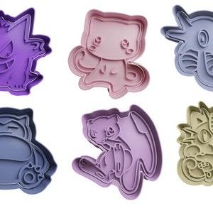 May include: Six different cookie cutters in various colors, featuring popular Pokemon characters. The cutters are made of plastic and are designed for use with cookie dough.