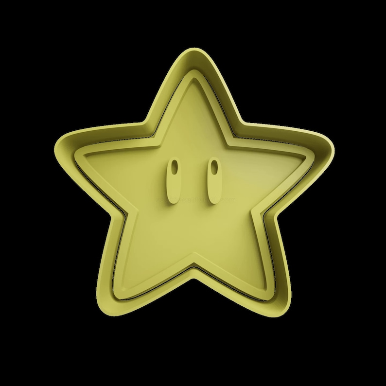Puede incluir: Un cortador de galletas en forma de estrella amarilla con dos peque&ntilde;os c&iacute;rculos recortados para los ojos.