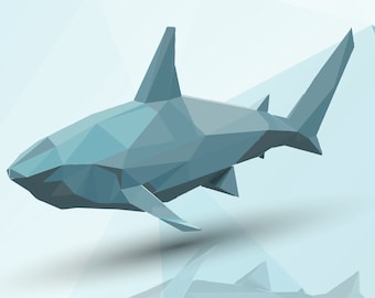 May include: A blue, low-poly shark illustration with a white background. The shark is in a swimming position with its tail raised.