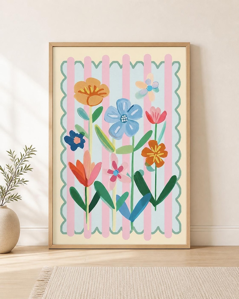 May include: A framed art print depicting a collection of vibrant flowers in orange, blue, pink, and red hues. The floral arrangement is set against a striped backdrop with a scalloped edge, all within a wooden frame.