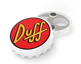 May include: White bottle opener with a red and yellow Duff logo on the top. The bottle opener is shaped like a bottle cap.