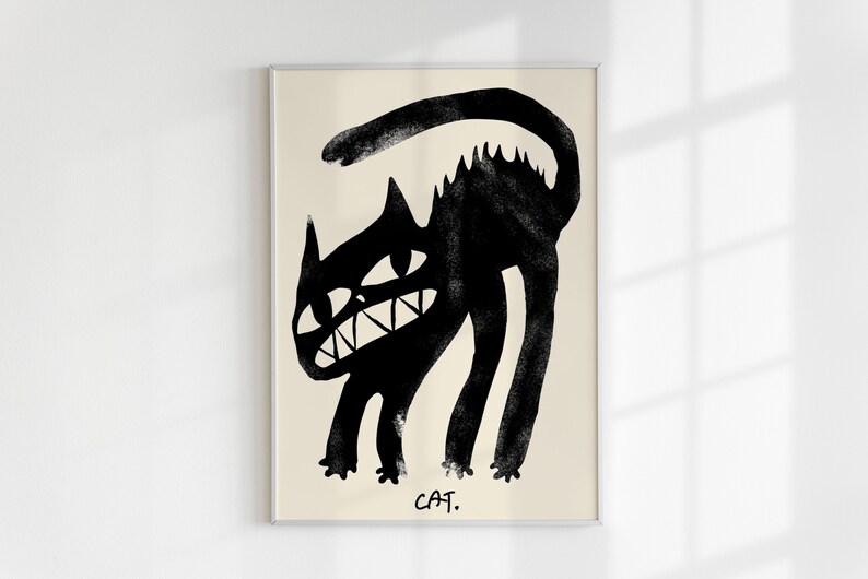 May include: A black and white illustration of a cat with a menacing expression. The cat is drawn in a simple, stylised manner and is set against a beige background. The text "CAT." is printed below the cat.
