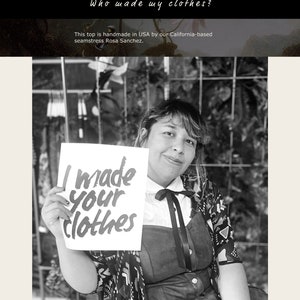 May include: A black and white photo of a woman holding a sign that says "I made your clothes". The woman is wearing a black and white patterned dress and a black bow.