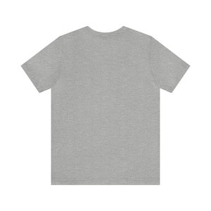 May include: A heather grey t-shirt with short sleeves.