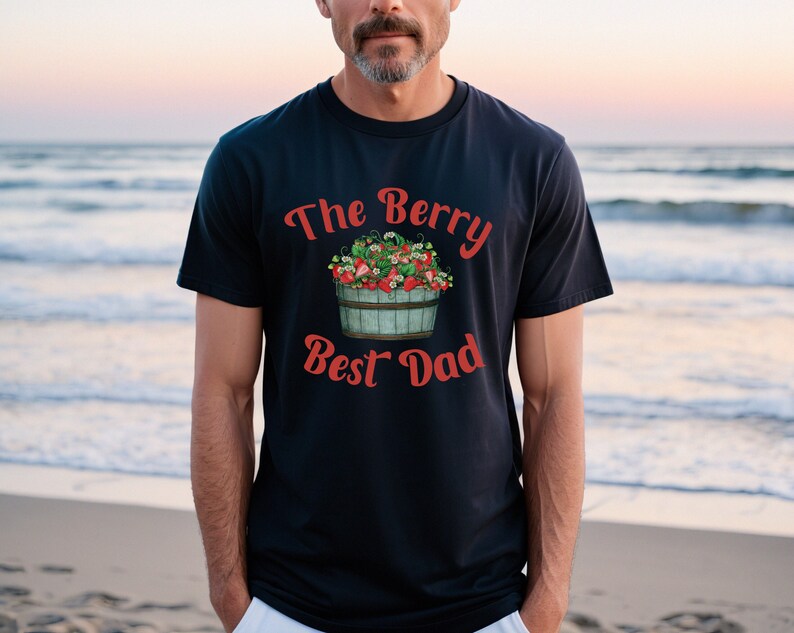 May include: A dark blue t-shirt with a red graphic of a basket of strawberries and the text "The Berry Best Dad".