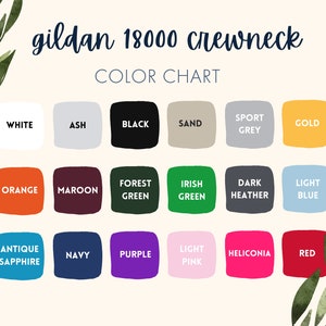 May include: Color chart for Gildan 18000 crewneck t-shirts. The chart shows 18 different colors, including white, ash, black, sand, sport grey, gold, orange, maroon, forest green, Irish green, dark heather, light blue, antique sapphire, navy, purple, light pink, heliconia, and red.