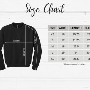 May include: Size chart for a sweatshirt with measurements in inches for width, length, and sleeve length. Sizes include XS, S, M, L, and XL.