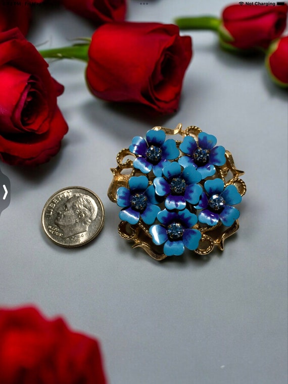 Vintage Avon blue brooch or necklace, blue crystal