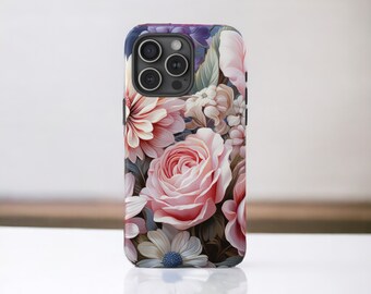 May include: A phone case with a floral design featuring pink, white, and purple flowers. The case has a black camera bump with four lenses.