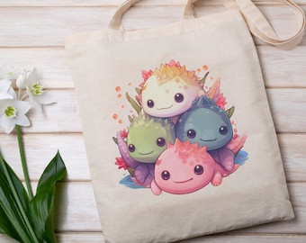 May include: A white tote bag featuring a colourful illustration of four cartoon axolotls. The axolotls are stacked on top of each other and are pink, green, blue and yellow.