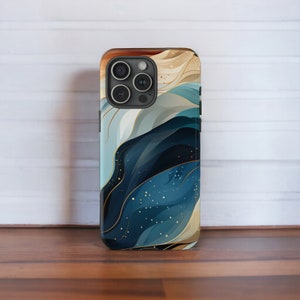 May include: A phone case featuring an abstract design in shades of blue, white and gold. The case has a cut-out for the phone's camera.