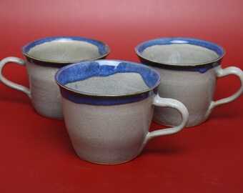 Gray mug with blue rim