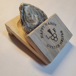 Happy Hands Oyster Helpers. Oyster shuckers.