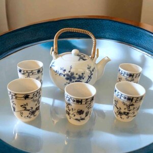 Classic Round Japanese teapot with Bamboo Handle and set of 5 Nikko Ironstone tea cups.