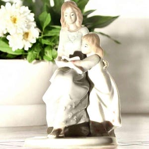 mother and daughter figurine by Paul Sebastian 1994.