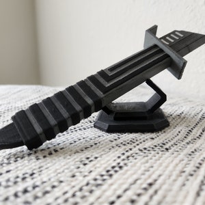 Half scale 3D printed Darksaber with stand