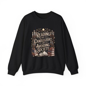 Reading by Candlelight and Avoiding Society Sweatshirt | Bookish Cozy Graphic