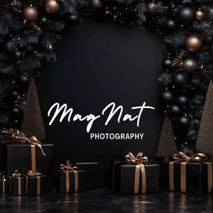 May include: Black and gold gift boxes with gold ribbon bows, arranged in front of a black background with a black and gold Christmas tree on each side. The text "Mag Nat PHOTOGRAPHY" is written in white on the black background.