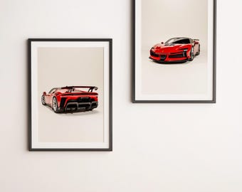 May include: Two framed photographs of red sports cars. The photo on the left shows the car from the back, while the photo on the right shows the car from the front.
