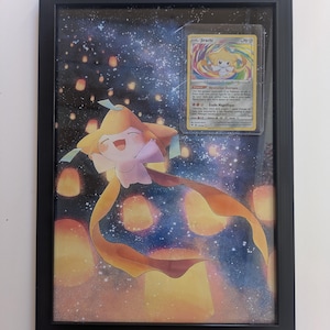 cadre photo pokémon avec carte Jirachi shiny