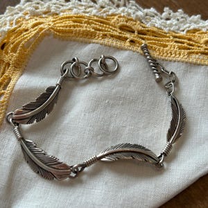Vintage Native American Sterling silver feather bracelet by Harvey Mace 7.5 inches