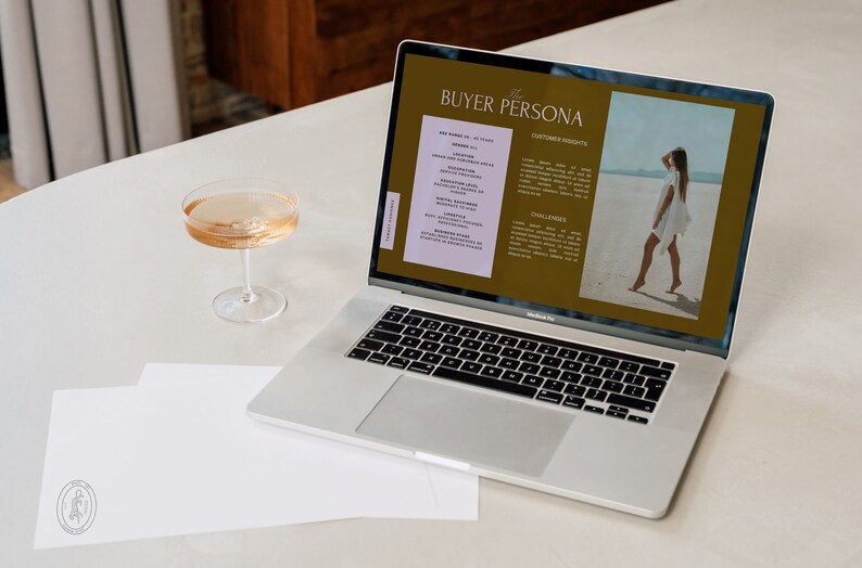 May include: A laptop computer displaying a buyer persona document with the title "The Buyer Persona". The document includes sections for customer insights and challenges. The background image is a woman walking on a beach.