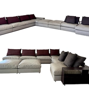 May include: A modern sectional sofa in light gray with dark burgundy and charcoal gray accent pillows. The sofa has a low profile and a dark brown side table. The design is contemporary and minimalist.