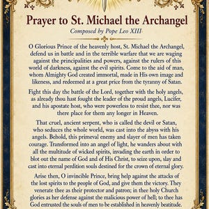 May include: A rectangular print featuring the Prayer to St. Michael the Archangel, composed by Pope Leo XIII. The text is centred within an ornate gold and blue border, topped with a golden sword and wings emblem on a parchment-coloured background.