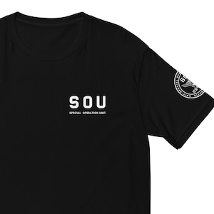 May include: Black t-shirt with white text that reads "SOU SPECIAL OPERATION UNIT" and a small white patch on the right sleeve with a design.