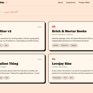 May include: A website design with a peach background and white boxes. The website showcases projects, including "Tally Editor v2" and "Brick & Mortar Books." Text includes "Ezra Wilde" and "Things I Make."