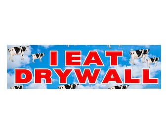 May include: A rectangular sticker with a blue sky background, white clouds, and black and white cows. The text "I EAT DRYWALL" is in large red letters.