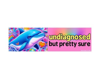 May include: A digital illustration featuring a blue dolphin with a butterfly and heart, surrounded by colorful sweets and rainbows. The text "undiagnosed but pretty sure" is displayed on a pink background.