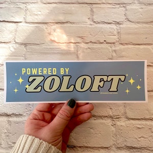 Powered by Zoloft Bumper Sticker or Magnet | Funny Sticker | Satire | Gen Z Humor | 8.5" x 2.5" Premium Weather-proof Vinyl