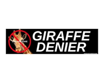 May include: A rectangular black sticker featuring a brown and white giraffe head on the left side, crossed out by a red circle. The text reads "THEY ARE FAKE" inside the circle and "GIRAFFE DENIER" in large white capital letters on the right.