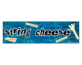 May include: A sticker with the words "string cheese" in a playful font, with a blue water background. Several pieces of string cheese are scattered around the text, with a few pieces grouped together.