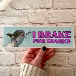 I brake for sharks Bumper Sticker or Magnet | Funny Sticker | Satire | Gen Z Humor 8.5" x 2.5" Premium Weather-proof Vinyl