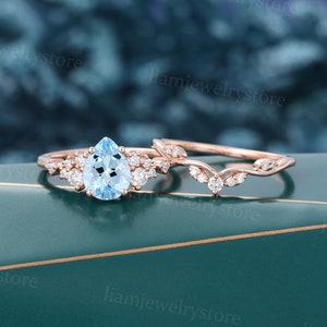 Birnenförmige Aquamarin-Verlobungsring-Set Einzigartige Rose Gold Verlobungsring Runde Diamant-Cluster-Ring Braut Hochzeit Versprechen Ring-Set Geschenk