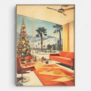 May include: A framed print depicts a mid-century modern living room with a Christmas tree, palm trees, and a mountain backdrop. The room features an orange sofa, rug, and chair, with a ceiling fan overhead. The artwork has a retro aesthetic.