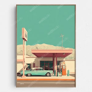 May include: A framed art print of a vintage gas station scene. The artwork features a teal car parked under a pink canopy, with a Route 66 sign and a teal sky. The style is reminiscent of mid-century modern art.