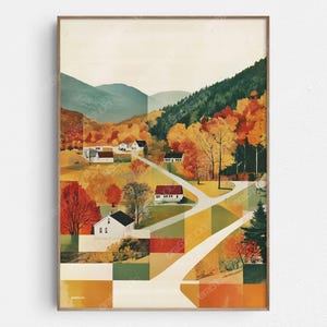 Könnte beinhalten: Ein gerahmter Kunstdruck, der eine ländliche Herbstlandschaft zeigt. Das Kunstwerk zeigt eine kurvenreiche Straße, Häuser und Bäume in Orange-, Gelb- und Grüntönen. Berge sind im Hintergrund zu sehen, und der Stil erinnert an ein Vintage-Gemälde.
