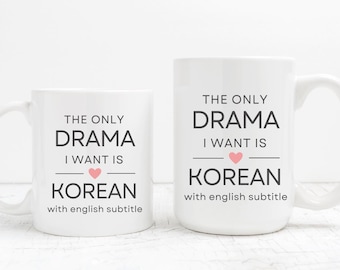May include: Two white coffee mugs with black text that reads "The only drama I want is Korean with english subtitle". The mugs are side by side on a white surface.