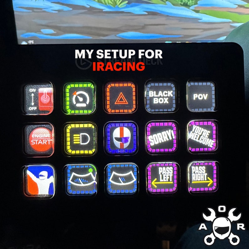 May include: A black Stream Deck with 16 customizable buttons, each with a different colored light and icon. The buttons are labeled with text such as "Engine Start", "Pass Left", "Pass Right", and "You're Welcome". The text "My Setup for iRacing" is displayed at the top of the Stream Deck.