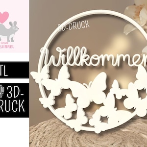 May include: White wooden sign with the German word "Willkommen" (Welcome) in cursive script, surrounded by butterfly cutouts. The sign is circular and has a 3D-DRUCK logo.