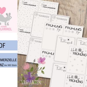 May include: A collection of white and black printable labels with floral and dotted designs. The labels feature the words "Frühling" and "Frühlingsgruss" in various fonts. The image also includes a squirrel graphic and the text ".PDF".