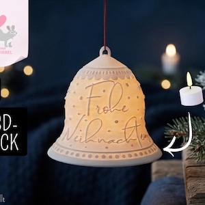 May include: A white, bell-shaped hanging ornament featuring the German text "Frohe Weihnachten" embossed on its surface. The ornament has a decorative dotted pattern along the rim and top, and it is suspended by a thin red string for display.
