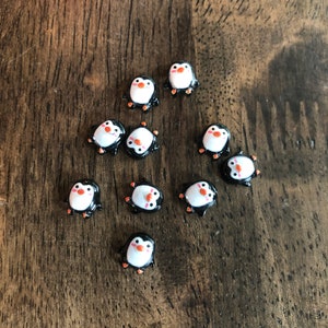 Pocket Penguin, tiny 9mm penguin, mini penguin.