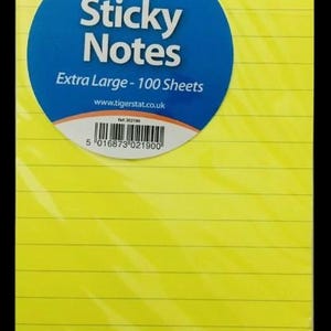 May include: A pack of extra large, yellow sticky notes with lined pages. A blue circular label reads "Sticky Notes" and "Extra Large - 100 Sheets". The brand name "Tiger" is also visible.